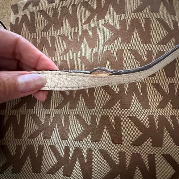 Michael Kors Monogram Drawstring Bucket Brown Mini WithTassel Crossbody Bag - Picture 9 of 14